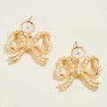 Gold & Pearl Bow Dangle Earrings
